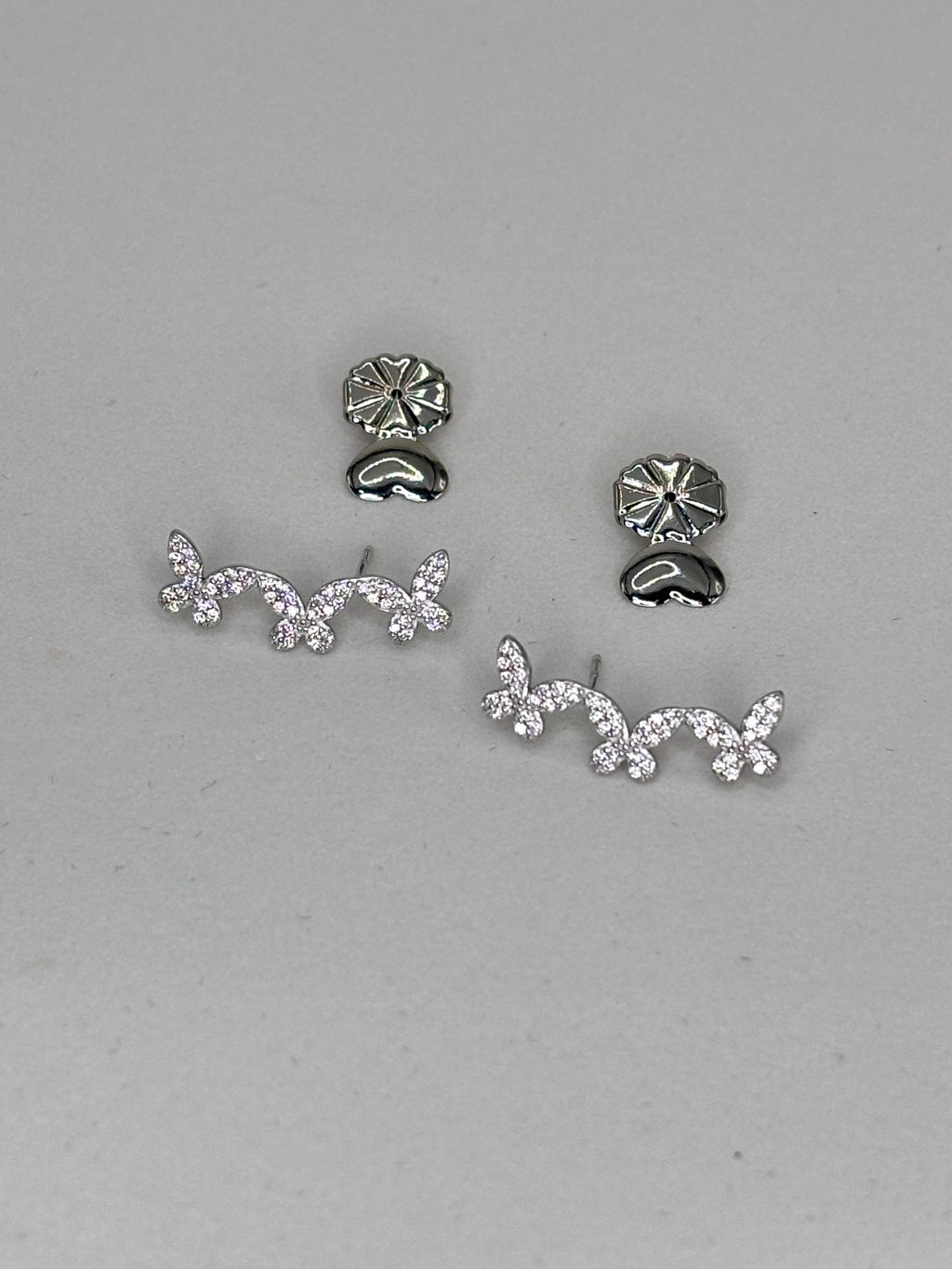 Brinco zirconia branca earcuff borboletas