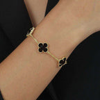 Pulseira Dourada Trevos Zircônia Preta - Galeria